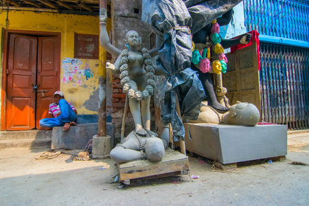KUMARTULI, KOLKATA, INDIA - OCTOBER 10, 2014 : Clay idol of Goddess Kali at Kumartuli, Kolkata , India. Idols are being prepared to be worshipped during Kali Puja, Hindu festival of Deepavali or Diwali.のeditorial素材