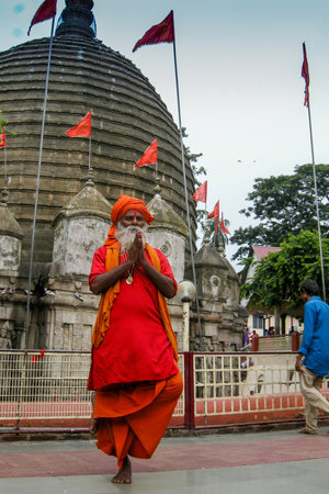 GUWAHATI, ASSAM, INDIA - JULY 4, 2014 : Hindu Sadhu standing by one bare foot for hours , at famous Kamakhya Temple or Kamrup-Kamakhya temple, dedicated to mother goddess Kamakhya.のeditorial素材