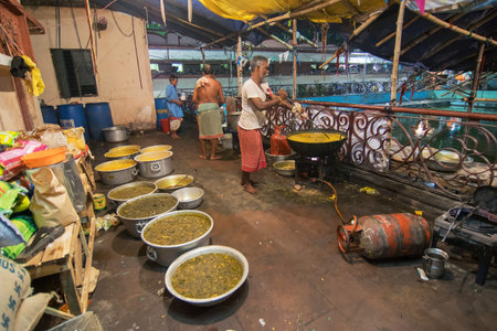 KOLKATA, WEST BENGAL, INDIA - 13 MAY 2017: Foods being prepared for devotees after worshipping Lord Hanuman, known as Hanuman ji in India. The holy food is called 'Prasadのeditorial素材