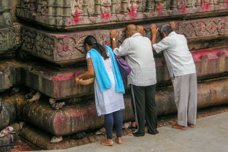 GUWAHATI, ASSAM, INDIA - JULY 4, 2014 : Hindu devotees worshiiping at Kamakhya Temple or Kamrup-Kamakhya temple, dedicated to the mother goddess Kamakhya.のeditorial素材