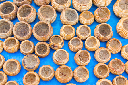 Cane pots , pots made of cane, handicrafts on display during the Handicraft Fair in Kolkata - the biggest handicrafts fair in Asia.の写真素材