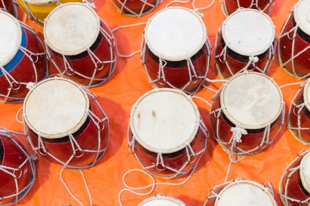 Tablas , membranophones , pair of small drums. Handicrafts on display during the Handicraft Fair in Kolkata , earlier Calcutta, West Bengal, India. It is the biggest handicrafts fair in Asia.の写真素材