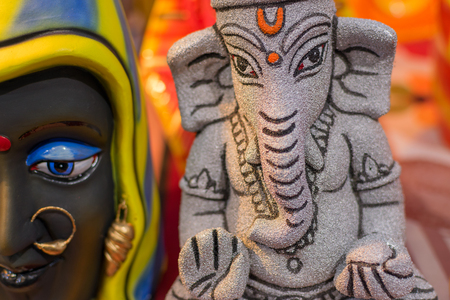 Colorful dolls made of clay, Lord Ganesha, handicrafts on display during the Handicraft Fair in Kolkata , earlier Calcutta, West Bengal, India. It is the biggest handicrafts fair in Asia.の写真素材