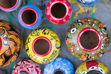 Bright colorful terracotta pots, works of handicraft, on display during Handicraft Fair in Kolkata - the biggest handicrafts fair in Asia.のeditorial素材