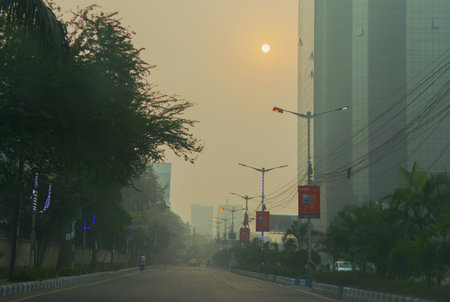KOLKATA, WEST BENGAL , INDIA - NOVEMBER 27TH 2016 : Eastern Metrapolitan Bypass of Kolkata - a road to Kolkata airport. Winter moring shot.のeditorial素材