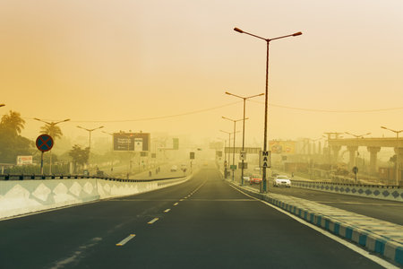 KOLKATA, WEST BENGAL , INDIA - NOVEMBER 27TH 2016 : Parama Island flyover, popularly known as Ma or Maa flyover long busy flyover. From Alipore to E.M. Bypass of Kolkata. Winter moring shot.のeditorial素材