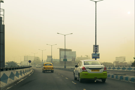 KOLKATA, WEST BENGAL , INDIA - NOVEMBER 27TH 2016 : Parama Island flyover, popularly known as Ma or Maa flyover long busy flyover. From Alipore to E.M. Bypass of Kolkata. Winter moring shot.のeditorial素材