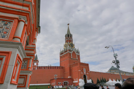 The Spasskaya Tower of the Moscow Kremlin on Red Square, with huge clock and five stars on top - The five-pointed red star has often served as a symbol of communism in Russia.のeditorial素材