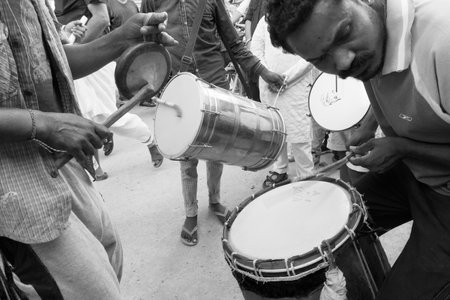 Many drummers playing drums at Rath jatra festival. Lord Blalaram is being worshipped for Rath jatra festival - at Howrah, West Bengal, India. Black & White image,のeditorial素材