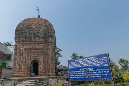 Terracotta decorations on the walls at Pratapeswar Temple at Kalna, West Bengal, India. Terracotta is a brownish-red clay that has been baked and is used for making things.のeditorial素材
