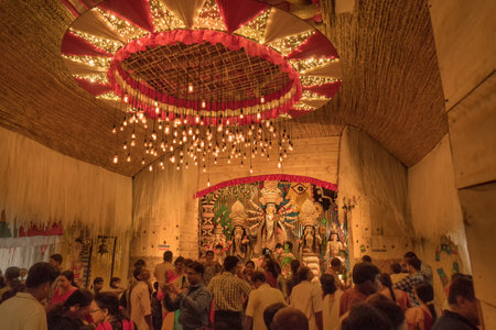 KOLKATA , INDIA - SEPTEMBER 26, 2017 : Night image of decorated Durga Puja pandal, shot at colored light, at Kolkata, West Bengal, India. Durga Puja is biggest religious festival of Hinduism.のeditorial素材