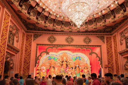 KOLKATA , INDIA - SEPTEMBER 26, 2017 : Night image of decorated Durga Puja pandal, shot at colored...