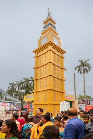 KOLKATA , INDIA - SEPTEMBER 29, 2017 : Decorated Durga Puja pandal - replica of London Big Ben watch of England , at Kolkata, West Bengal, India. Biggest religious festival of Hinduism.のeditorial素材