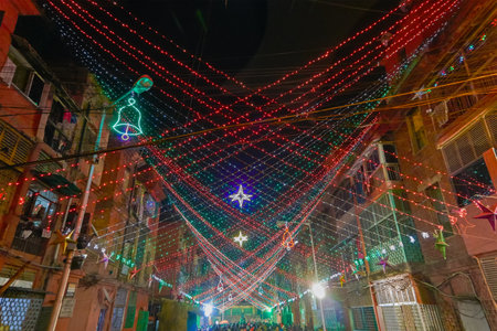 KOLKATA, WEST BENGAL, INDIA - DECEMBER 24TH 2017 : Street is decoarted with overhead lights at Bow Barracks - a famous Anglo-Indian street of Kolkata, at night.のeditorial素材