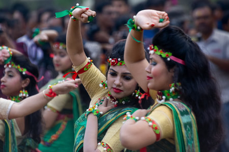 KOLKATA , INDIA - MARCH 1, 2018 : Beautiful young girls with spring festive make up with flowers ,...