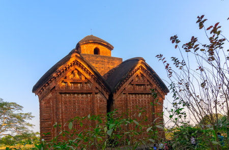 Radhashyam Temple - made of terracotta (fired clay of a brownish-red colour, used as ornamental building material) artworks at Bishnupur, West Bengal, India. Popular UNESCO heritage site of India.のeditorial素材