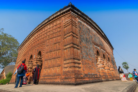 BISHNUPUR, WEST BENGAL / INDIA - DECEMBER 26, 2015 : Famous terracotta (fired clay of a brownish-red colour, used as ornamental building material) artworks at Madanmohan Temple, UNESCO heritage site.のeditorial素材