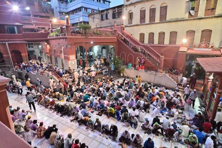 KOLKATA, WEST BENGAL, INDIA - MAY 27 2019 : Muslim people breaking their day long fasting by having...