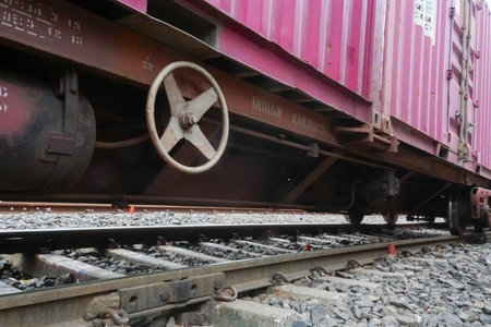 Howrah, West Bengal , India - 19th August 2018 : A railway wagon is passing through railway tracks. Huge Industrial goods are carried across the country by wagons and helps industry to reduce cost.のeditorial素材