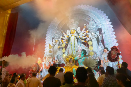 Kolkata, India - October 18, 2018 : Goddess Durga idol being worshipped inside decorated Durga Puja...