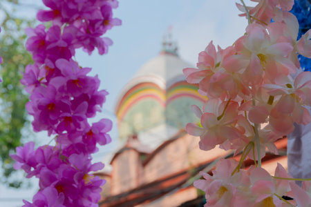 Kolkata, West Bengal, India - 15th April 2019 : Floral gateway to defocussed Kalighat temple on Bengali new year. Big Hindu Bengali festival is organized on every Bengali new year here.のeditorial素材