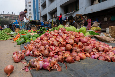 Kolkata, West Bengal, India - 16th December 2018 : The onion, bulb onion or common onion, is a vegetable widely cultivated species of the genus Allium. For sale in a market in Territy Bazar, Kolkata.のeditorial素材