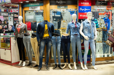 Kolkata, West Bengal, India - 29th December 2019 : Attractive male and female mannequins on display, New Market, esplanade area in the evening. It is one of the oldest and busiest markets in Kolkata.のeditorial素材