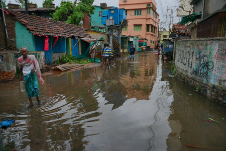 Howrah, West Bengal, India - 21st May 2020 : Rain water logged road, due to Super cyclone Amphan. The devastation has made many damages to West Bengal state.のeditorial素材