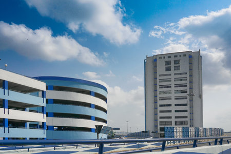 Howrah, West Bengal, India - May 23rd 2020 : Car parking lot and Nabanna, building in Howrah, houses the State Secretariat of West Bengal. Office of the respected Chief Minister, Smt. Mamata Banerjee.のeditorial素材