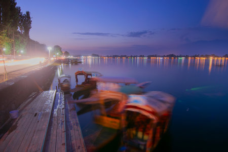 Shree Nagar,Jammu and Kashmir,India-31st August 2014 : Beautiful Dal lake in blue hour after sunset, houseboats floating on water with evening sky. Major tourist attraction from all over the world.のeditorial素材