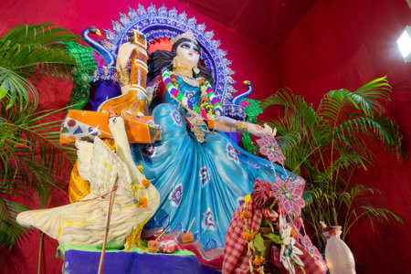 Idol of Goddess Saraswati at Kolkata, West Bengal, India is being worshipped. Saraswati is Hindu goddess.のeditorial素材