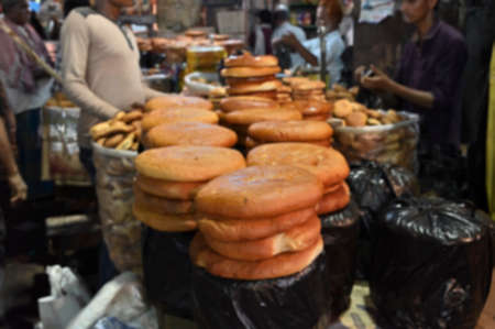 Blurred image of breads being sold as street food in Kolkata, West Bengal, India.