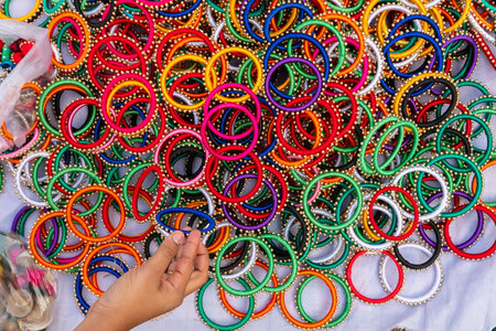 Colorful Indian bangles, handicrafts, on display during the Handicraft Fair in Kolkata - the biggest handicrafts fair in Asia.の写真素材