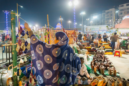 Kolkata, West Bengal, India - 31st December 2018 : Seller woman arranging handmade jute products,...