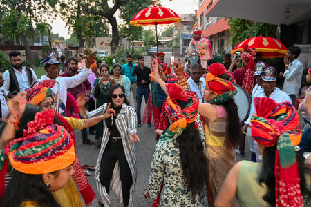 Jodhpur, Rajasthan, India - 19th October 2019 : Celebration of Sindhi Marriage at a Hotel, traditional Indian dressed people are dancing and enjoying happy moments of marriage ceremony.のeditorial素材