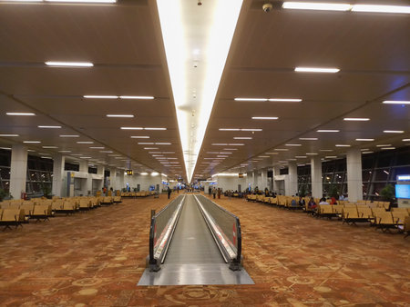 Delhi, India - 25th April 2018 : Horizontal escalator for passengers with luggage at Indira Gandhi Inernational Airport, IGI. Busiest airport of India, serving capital New Delhi and northern India.のeditorial素材