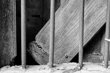 Black and white image of an old broken window. Howrah, West Bengal, India.の写真素材