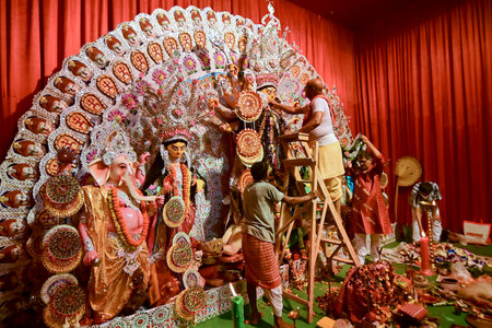 Howrah, India - October 15th, 2021: Preparation before Sandhi Puja, the sacred juncture of Ashtami, eighth day and Nabami, nineth day, as Hindu ritual for praying to Goddess Durga.Durga puja festival.のeditorial素材