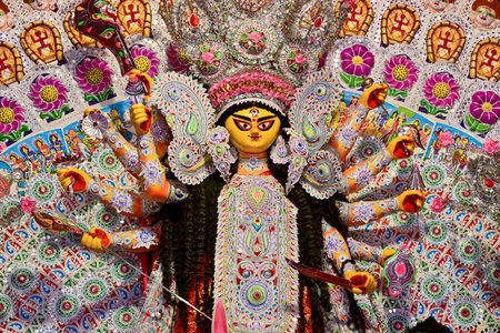Kolkata, West Bengal, India - 12th October, 2021 : Decorated Durga idol inside pandal at night. Durga puja is Biggest festival of Hinduism celebrated all over the world. UNESCO cultural heritage.のeditorial素材