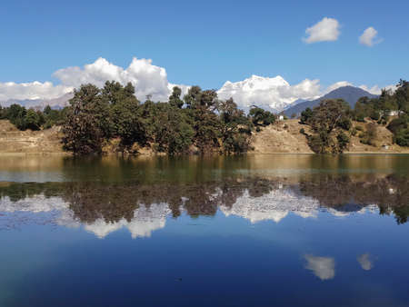 Reflection of Choukhamba mountains, Himalayan mountain range, Uttarakhand, India.