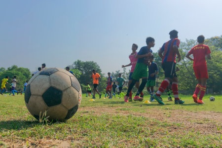 Howrah,West Bengal,India- 22nd April 2019 : Football playing students at ground of Indian Institute of Engineering Science and Technology, IIEST, formerly B.E.College Shibpur,students in campus.のeditorial素材