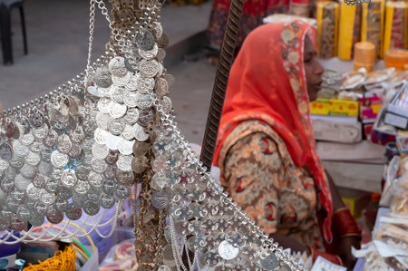 Jodhpur, Rajasthan, India - 20.10.2019 : White necklaces are being sold at famous Sardar Market and Ghanta ghar Clock tower in Jodhpur.のeditorial素材