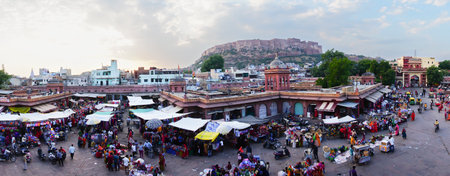 Jodhpur, Rajasthan, India - 16.10.2019 : Panoramic view from top, famous Sardar Market and Ghanta ghar Clock tower with Mehrangarh fort in background.のeditorial素材