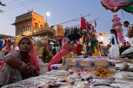 Jodhpur, Rajasthan, India - 19.10.2019 : Rajasthani women are buying bangles and jewelry at famous Sardar Market and Ghanta ghar Clock tower in Jodhpur, Rajasthan, India.のeditorial素材