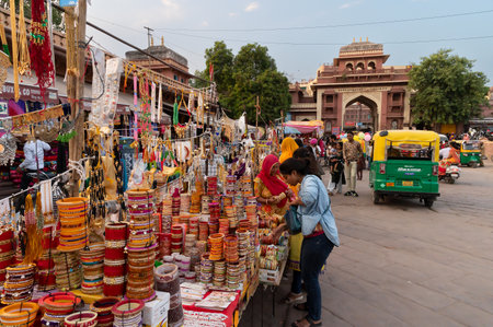 Jodhpur, Rajasthan, India - 20.10.2019 : Beautiful Rajasthani Bangles being sold at famous Sardar Market and Ghanta ghar Clock tower in Jodhpur, Rajasthan, India.のeditorial素材