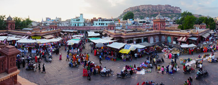 Jodhpur, Rajasthan, India - 16.10.2019 : Panoramic view from top, famous Sardar Market and Ghanta ghar Clock tower with Mehrangarh fort in background.のeditorial素材