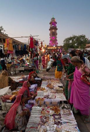 Jodhpur, Rajasthan, India - 19.10.2019 : Rajasthani women are buying bangles and jewelry at famous Sardar Market and Ghanta ghar Clock tower in Jodhpur, Rajasthan, India.のeditorial素材