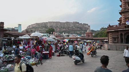 Jodhpur, Rajasthan, India - 20.10.2019 : Afternoon image of famous Sardar Market and Ghanta ghar Clock tower in Jodhpur, Rajasthan, India. Mehrangarh fort or Jodhpur fort in background.のeditorial素材