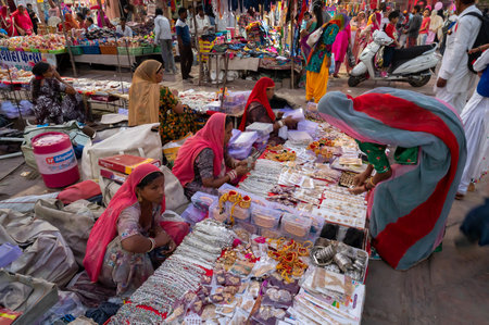 Jodhpur, Rajasthan, India - 19.10.2019 : Rajasthani women are buying bangles and jewelry at famous Sardar Market and Ghanta ghar Clock tower in Jodhpur, Rajasthan, India.のeditorial素材