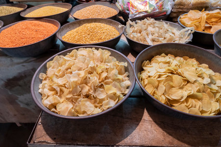 Jodhpur, Rajasthan, India - 18.10.2019 : Rajasthani papad and Moong dal, Urad dal, Masoor dal, Chana dal and Toor or toovar dal being sold, Sardar market or Clock tower market of Jodhpur.のeditorial素材